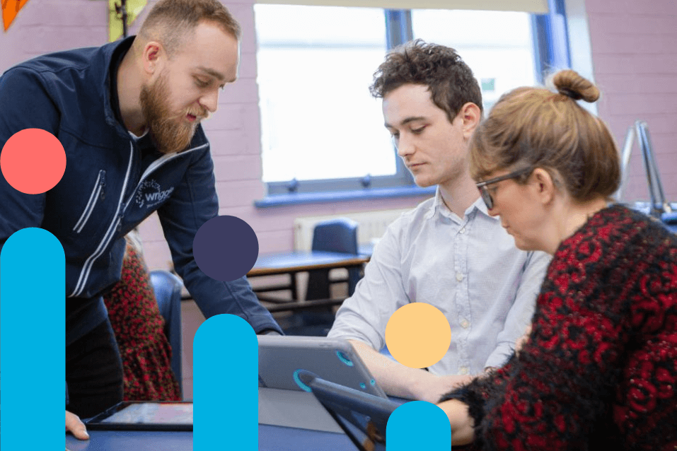 a teacher showing other teachers how to use an ipad in class