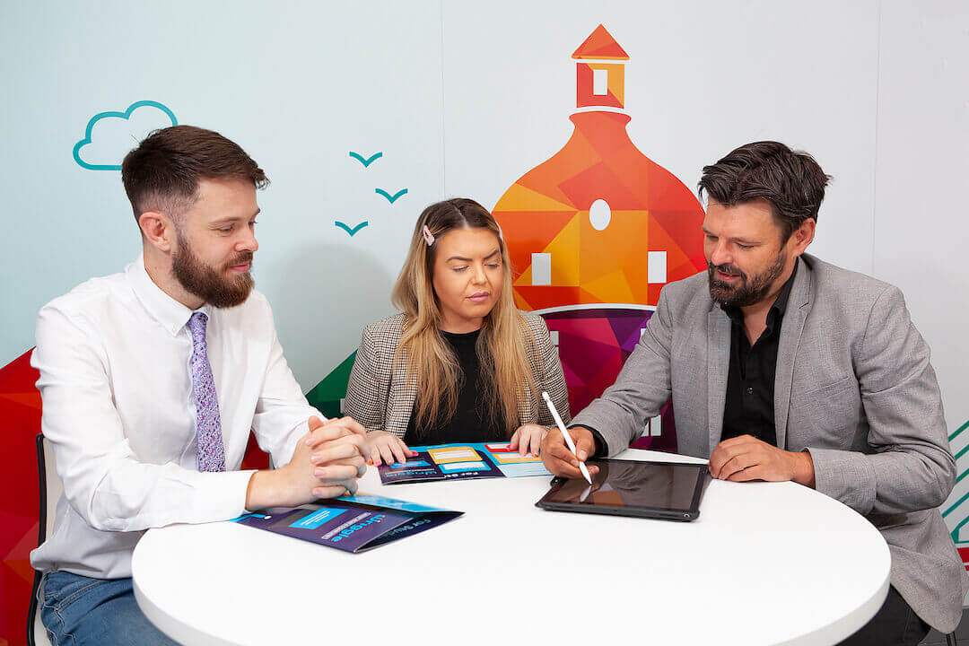 a group of people around a table