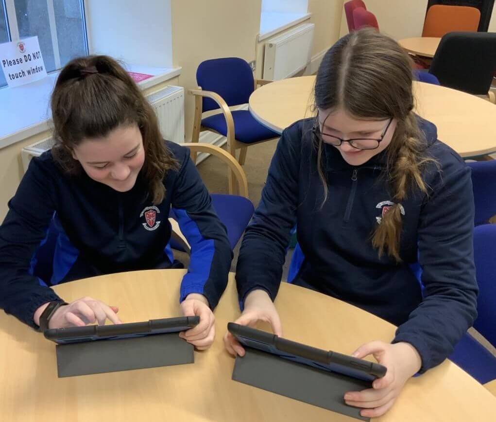 students using iPads in class