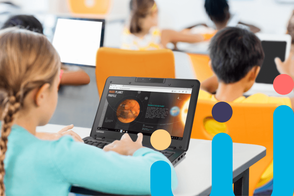 A girl using a laptop in the classroom