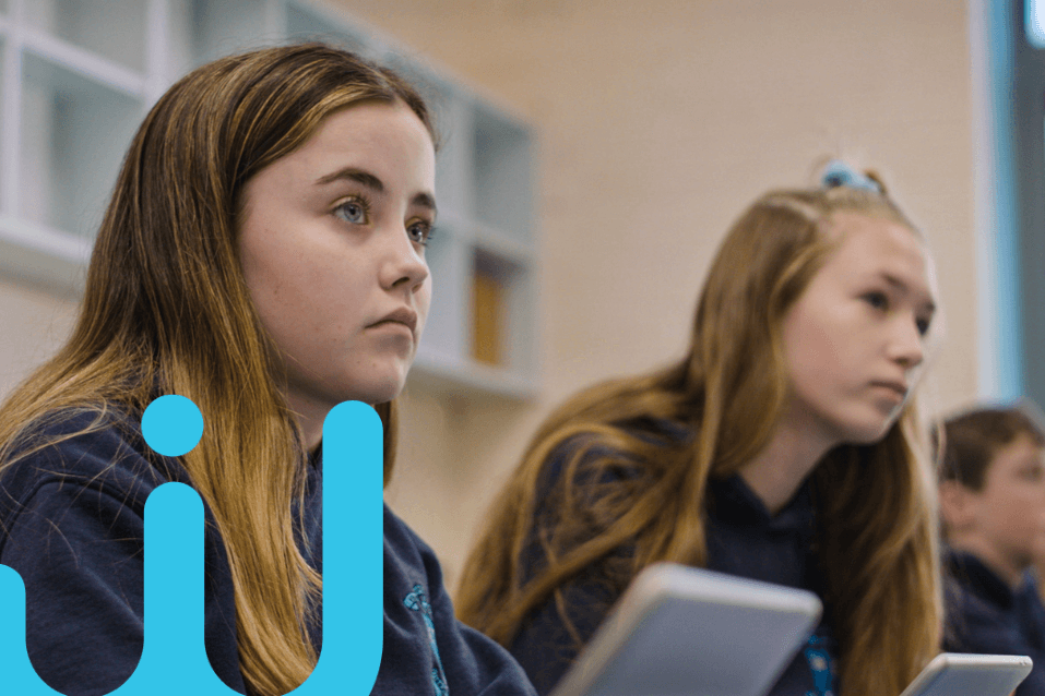 students using tablets in the classroom