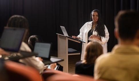 A lecturer using Mac in college